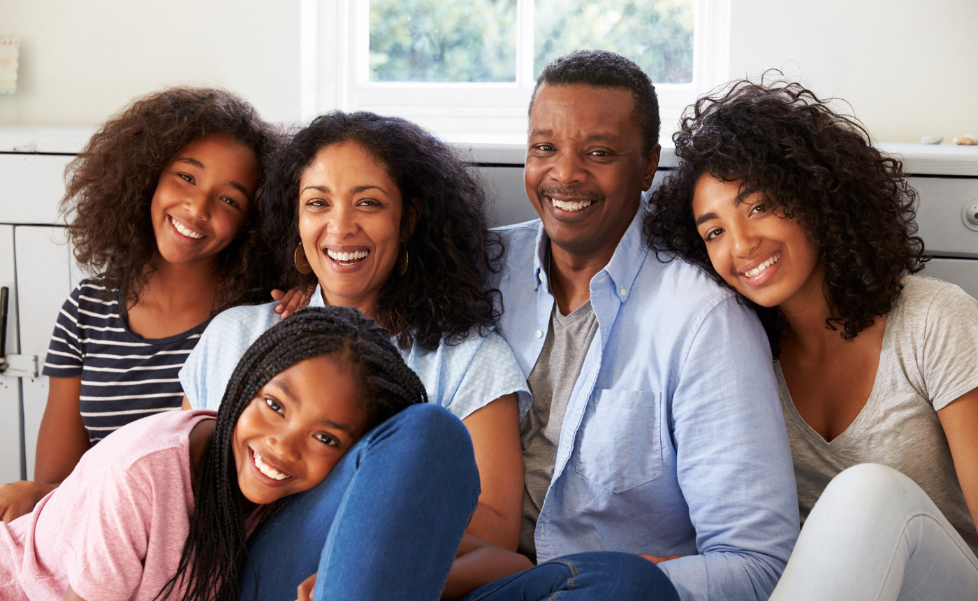black parents with three adolescent daughters